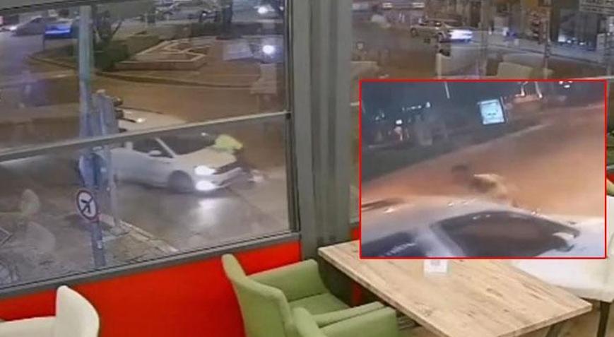 Yer: İzmir... Alkollü sürücü polis memurunu aracın kaputunda 500 metre sürükledi