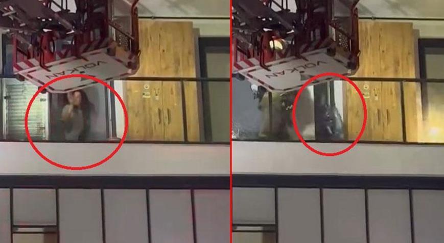 Dairesini ateşe vermek isteyen kadın ekiplere damacana fırlattı