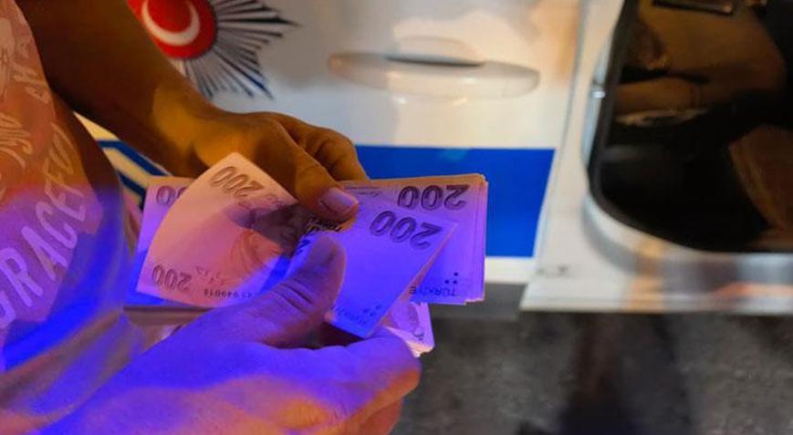 Aracın kaputunda 30 bin TL buldu polisse teslim etti
