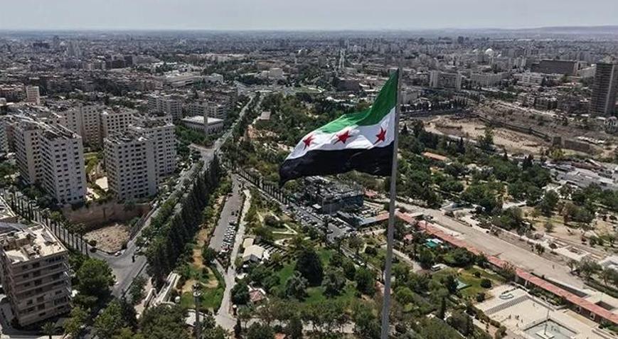Suriye ordusu, terör örgütü YPGnin ağır silahlarını teslim almaya başladı